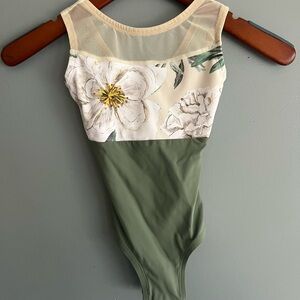 Lucky Leo brand floral top with sage green bottom.